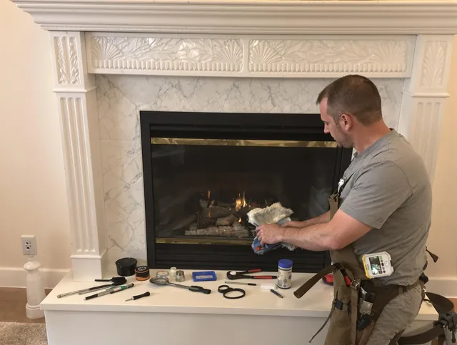 Stafford Chimney Sweep performing fireplace maintenance in Stafford, CT